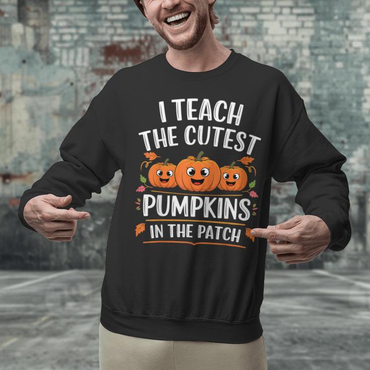 Teacher Halloween I Teach The Cutest Pumpkins In The Patch Unisex Sweatshirt, gift for family, gift for coworker