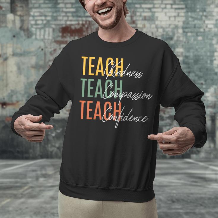 Teacher Kindness Compassion Confidence Teaching Unisex Sweatshirt, gift for family, gift for coworker Teacher Kindness Compassion Confidence Teaching Unisex Sweatshirt, gift for family, gift for coworker