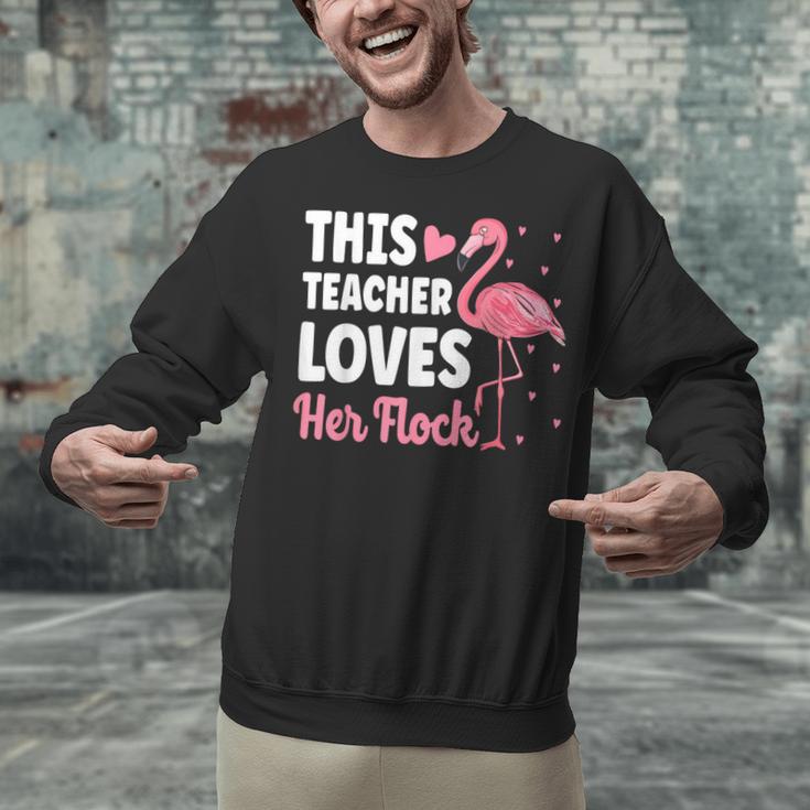 This Teacher Loves Her Flock Teaching Flamingo Girl Unisex Sweatshirt, gift for family, gift for coworker This Teacher Loves Her Flock Teaching Flamingo Girl Unisex Sweatshirt, gift for family, gift for coworker
