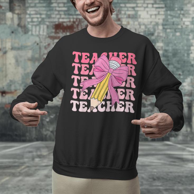 Teacher Pencil Back To School Groovy Pink Teacher First Day Unisex Sweatshirt, Groovy Teacher Sweatshirts, gift for family, gift for coworker