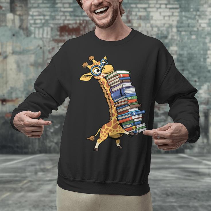 Teacher Shirt Giraffe Holding Books Bookworm Librarian Unisex Sweatshirt, gift for family, gift for coworker Teacher Shirt Giraffe Holding Books Bookworm Librarian Unisex Sweatshirt, gift for family, gift for coworker