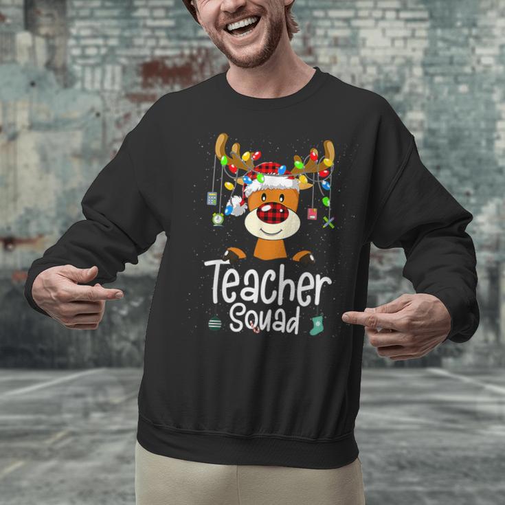 Teacher Squad Red Plaid Rudolph Reindeer Christmas Unisex Sweatshirt, gift for family, gift for coworker Teacher Squad Red Plaid Rudolph Reindeer Christmas Unisex Sweatshirt, gift for family, gift for coworker