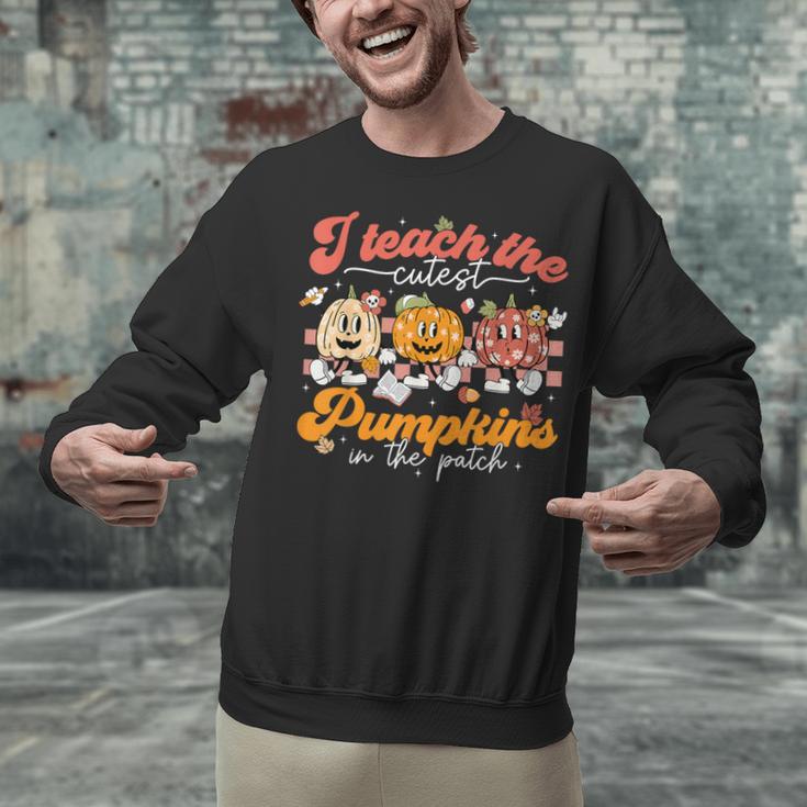 Teacher I Teach The Cutest Pumpkins In The Patch Fall Autumn Unisex Sweatshirt, gift for family, gift for coworker Teacher I Teach The Cutest Pumpkins In The Patch Fall Autumn Unisex Sweatshirt, gift for family, gift for coworker