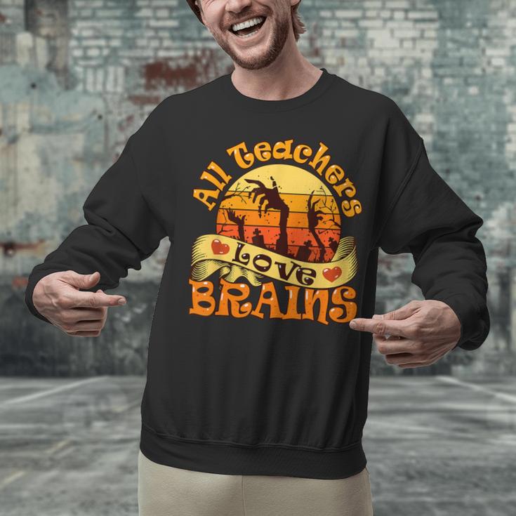 Teacher All Teachers Love Brains Halloween Party Unisex Sweatshirt, gift for family, gift for coworker Teacher All Teachers Love Brains Halloween Party Unisex Sweatshirt, gift for family, gift for coworker