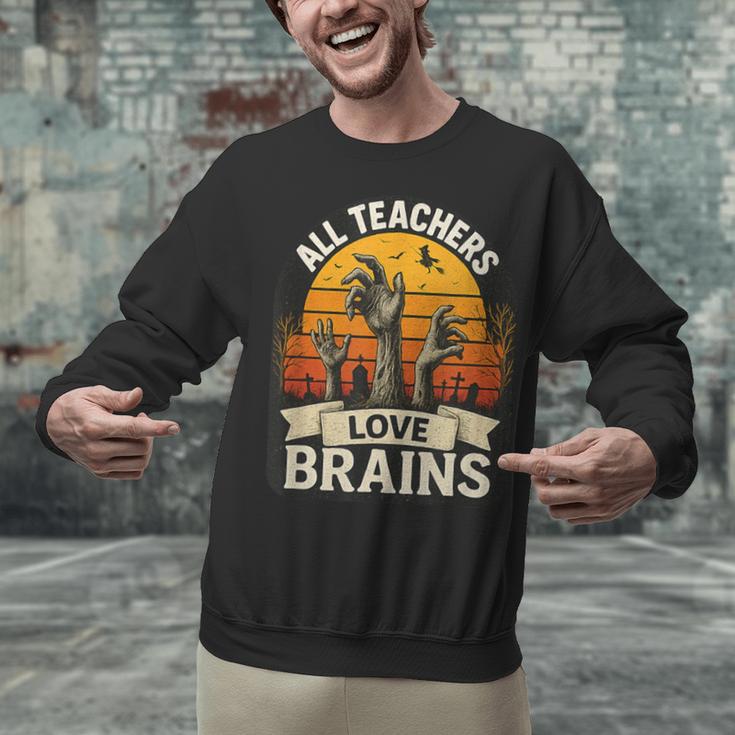 Teacher All Teachers Love Brains Halloween Unisex Sweatshirt, gift for family, gift for coworker Teacher All Teachers Love Brains Halloween Unisex Sweatshirt, gift for family, gift for coworker