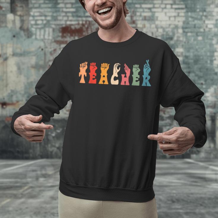 Teacher Word In Sign Language Awareness ASL Back To School Unisex Sweatshirt, gift for family, gift for coworker Teacher Word In Sign Language Awareness ASL Back To School Unisex Sweatshirt, gift for family, gift for coworker