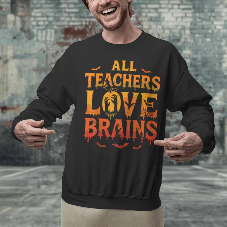 All Teachers Love Brains Shirt Halloween Teacher Unisex Sweatshirt, gift for family, gift for coworker All Teachers Love Brains Shirt Halloween Teacher Unisex Sweatshirt, gift for family, gift for coworker
