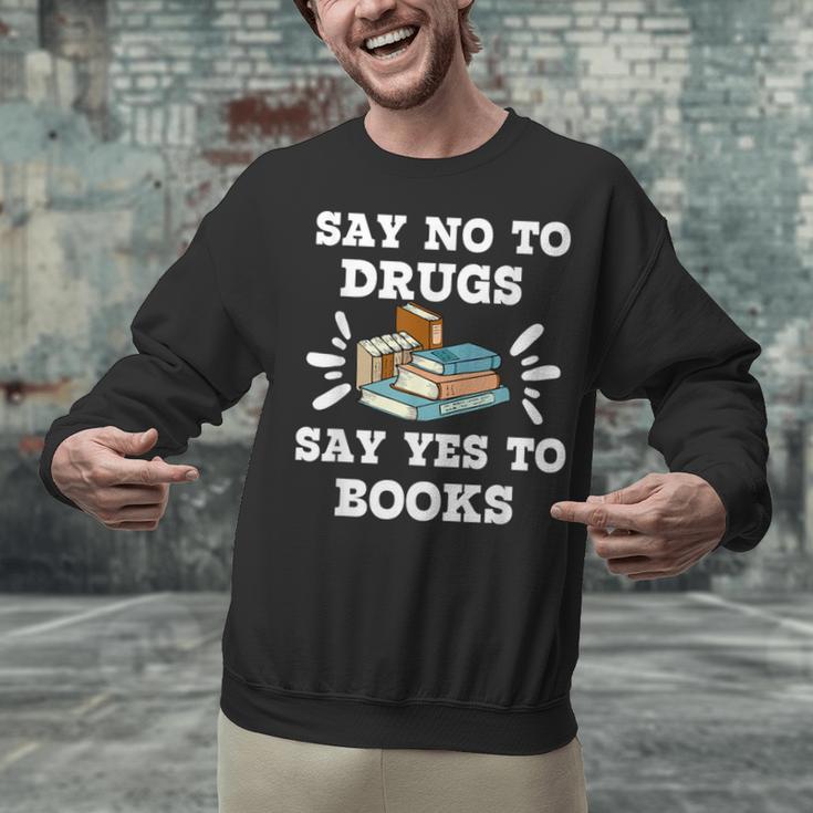 Teachers Red Ribbon Week Say No To Drugs Say Yes To Books Unisex Sweatshirt, gift for family, gift for coworker Teachers Red Ribbon Week Say No To Drugs Say Yes To Books Unisex Sweatshirt, gift for family, gift for coworker
