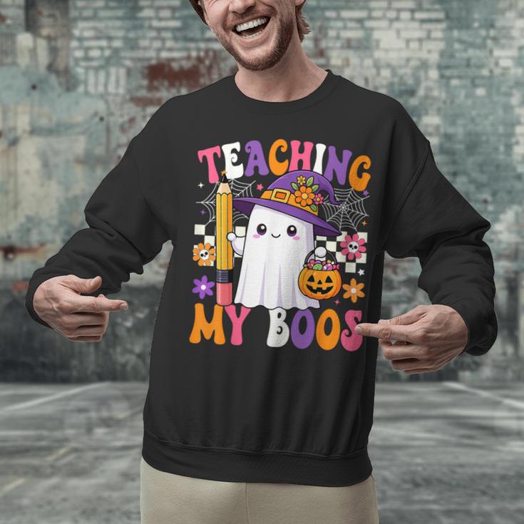 Teaching My Boos Ghost Teacher Cute Pencil Halloween Teacher Unisex Sweatshirt, gift for family, gift for coworker Teaching My Boos Ghost Teacher Cute Pencil Halloween Teacher Unisex Sweatshirt, gift for family, gift for coworker