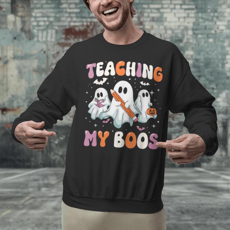 Teaching My Boos Teacher Cute Ghost Teacher Halloween Unisex Sweatshirt, gift for family, gift for coworker Teaching My Boos Teacher Cute Ghost Teacher Halloween Unisex Sweatshirt, gift for family, gift for coworker