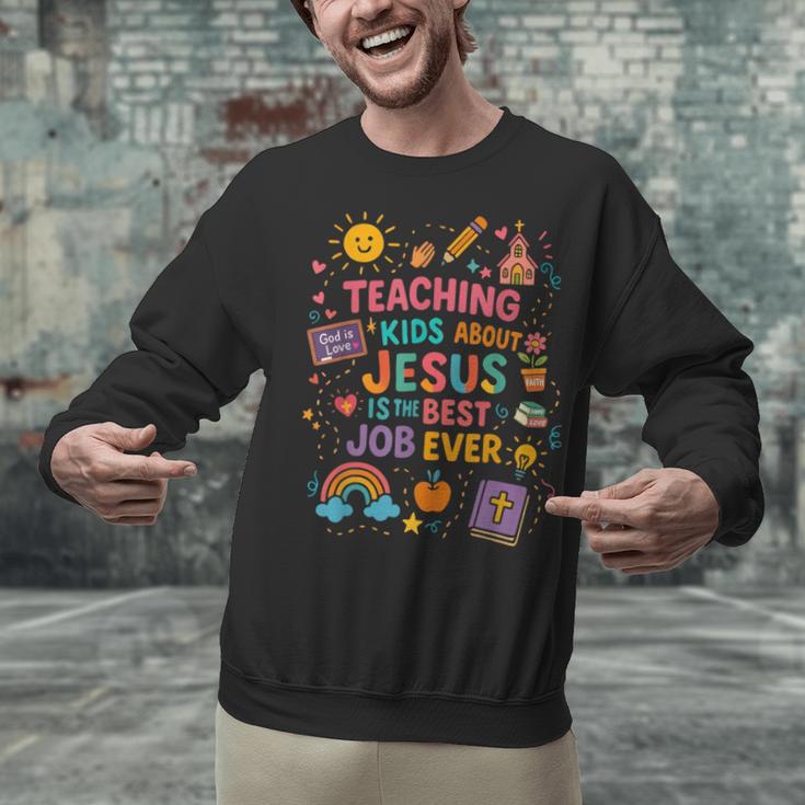 Teaching Kids About Jesus Is The Best Job Ever Bible Teacher Unisex Sweatshirt, gift for family, gift for coworker Teaching Kids About Jesus Is The Best Job Ever Bible Teacher Unisex Sweatshirt, gift for family, gift for coworker