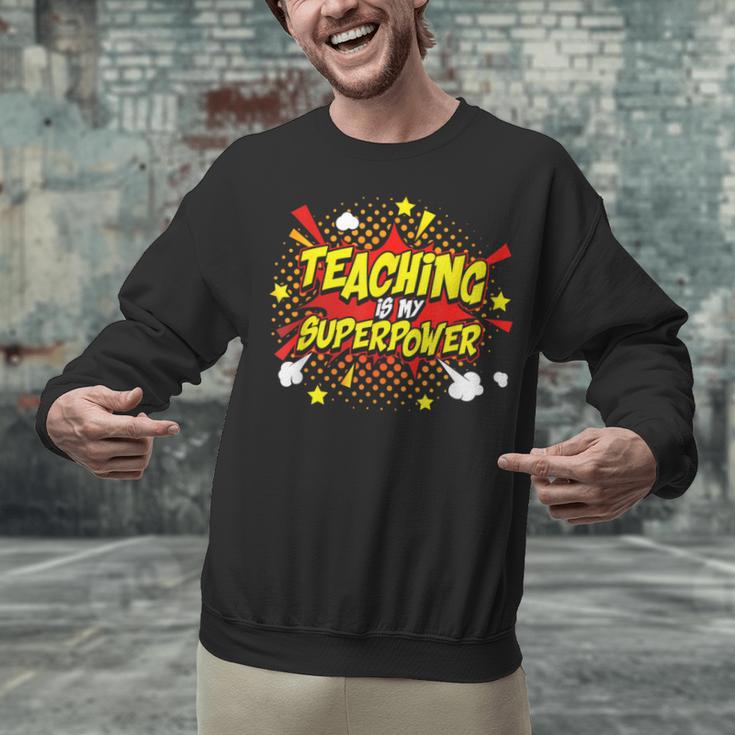Teaching Is My Superpower Retro Comic Teacher Unisex Sweatshirt, gift for family, gift for coworker Teaching Is My Superpower Retro Comic Teacher Unisex Sweatshirt, gift for family, gift for coworker