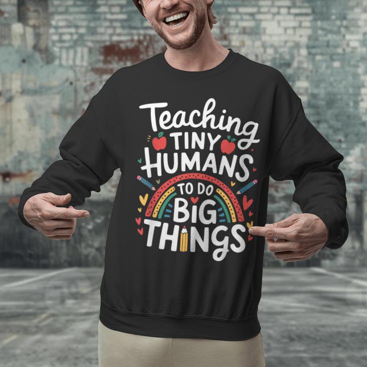 Teaching Tiny Humans Big Things I Teacher Unisex Sweatshirt, gift for family, gift for coworker Teaching Tiny Humans Big Things I Teacher Unisex Sweatshirt, gift for family, gift for coworker