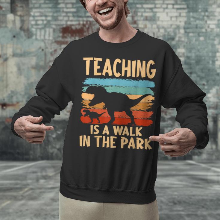 Teaching Is a Walk In Park Dinosaur Teacher Unisex Sweatshirt, gift for family, gift for coworker