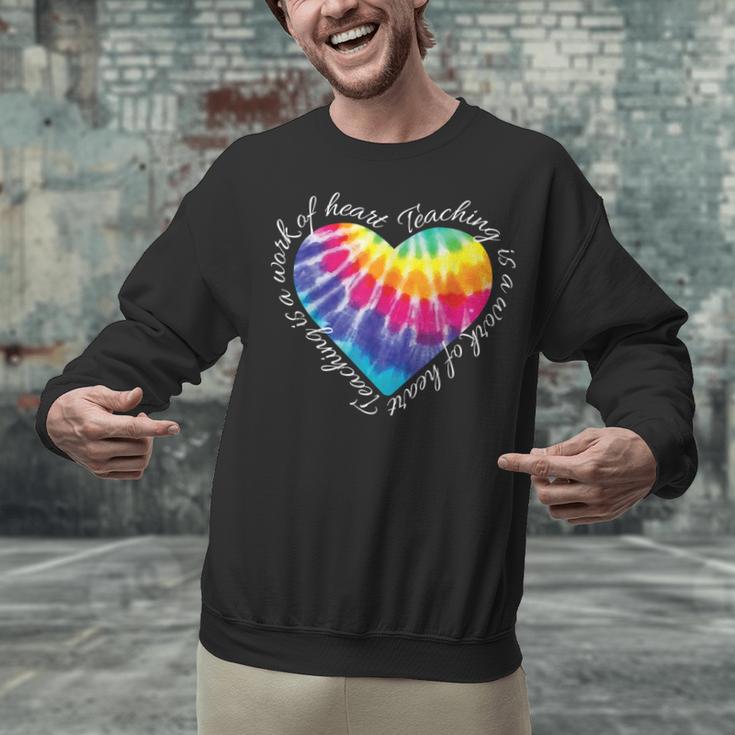 Teaching Is a Work Of Heart Tie Dye Hippie For Teacher For Men Women Girls Kids Unisex Sweatshirt, gift for family, gift for coworker Teaching Is a Work Of Heart Tie Dye Hippie For Teacher For Men Women Girls Kids Unisex Sweatshirt, gift for family, gift for coworker
