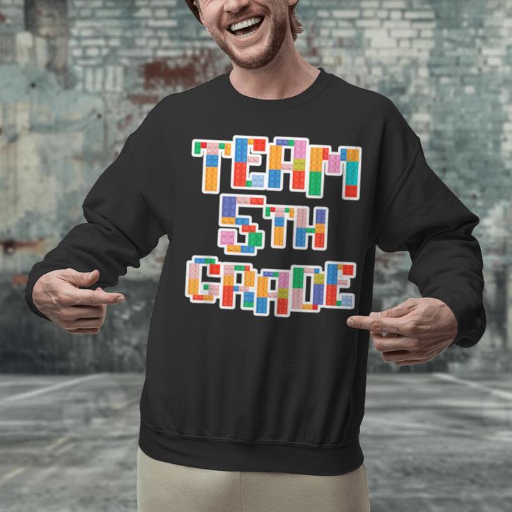 Team 5th Grade Building Blocks Bricks Theme Teacher Team For Men Women Kids Unisex Sweatshirt, gift for family, gift for coworker