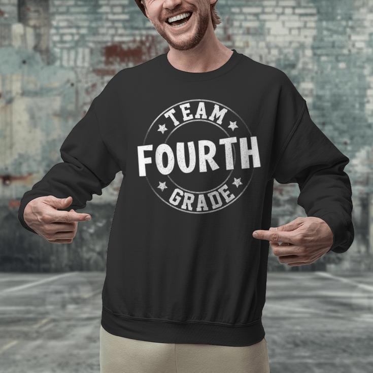 Team Fourth Grade Teacher Student Back To School 4th Grade Unisex Sweatshirt, 4th Grade Teacher Sweatshirts, gift for family, gift for coworker