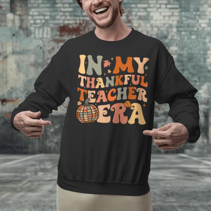 In My Thankful Teacher Era Cute Groovy Thanksgiving Teacher Unisex Sweatshirt, Groovy Teacher Sweatshirts, gift for family, gift for coworker In My Thankful Teacher Era Cute Groovy Thanksgiving Teacher Unisex Sweatshirt, Groovy Teacher Sweatshirts, gift for family, gift for coworker