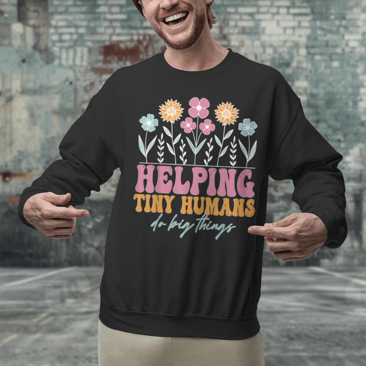 Tiny People Help Do Big Things Nursery Teacher Unisex Sweatshirt, gift for family, gift for coworker