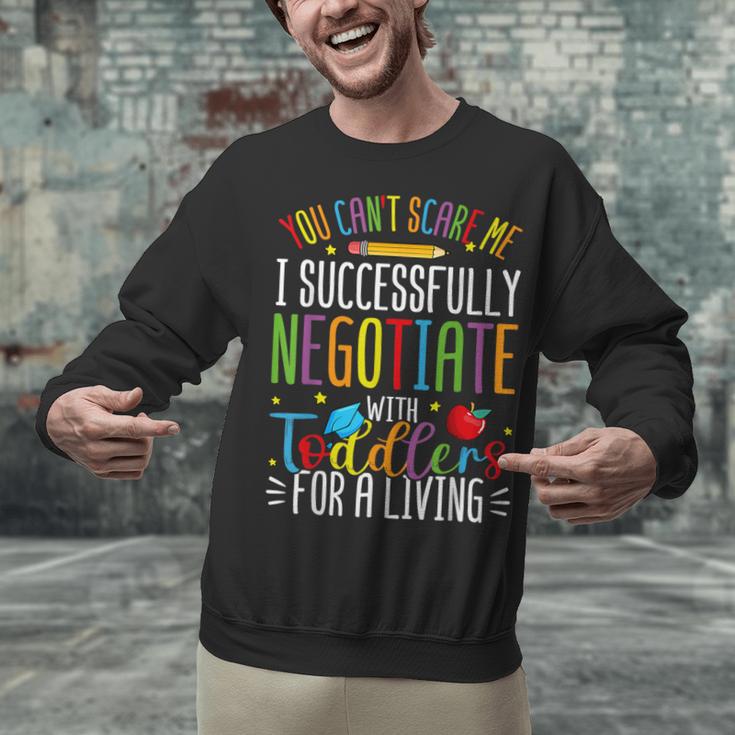 Toddler Negotiator Preschool Teacher Humor Babysitters Unisex Sweatshirt, gift for family, gift for coworker Toddler Negotiator Preschool Teacher Humor Babysitters Unisex Sweatshirt, gift for family, gift for coworker