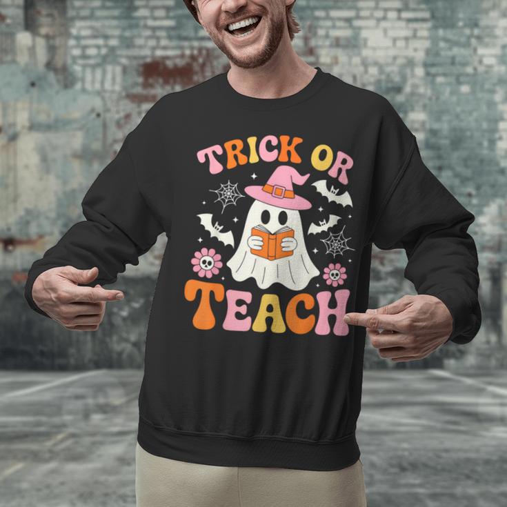 Trick Or Teach Cute Floral Ghost Teacher Halloween Costume Unisex Sweatshirt, gift for family, gift for coworker