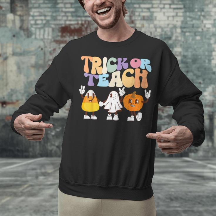 Trick Or Teach Cute Halloween Teacher Unisex Sweatshirt, gift for family, gift for coworker