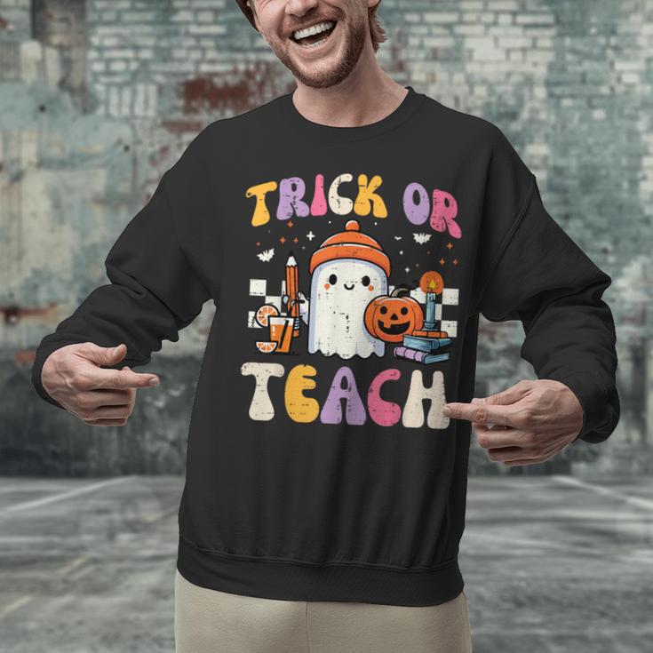 Trick Or Teach Ghost Teacher School Halloween Men Women Unisex Sweatshirt, gift for family, gift for coworker