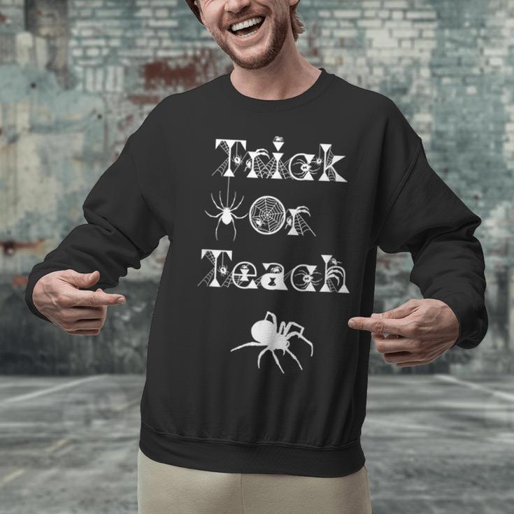 Trick Or Teach Halloween Teacher Shirt Teaching Spider Tee For Men Women Kids Unisex Sweatshirt, gift for family, gift for coworker Trick Or Teach Halloween Teacher Shirt Teaching Spider Tee For Men Women Kids Unisex Sweatshirt, gift for family, gift for coworker