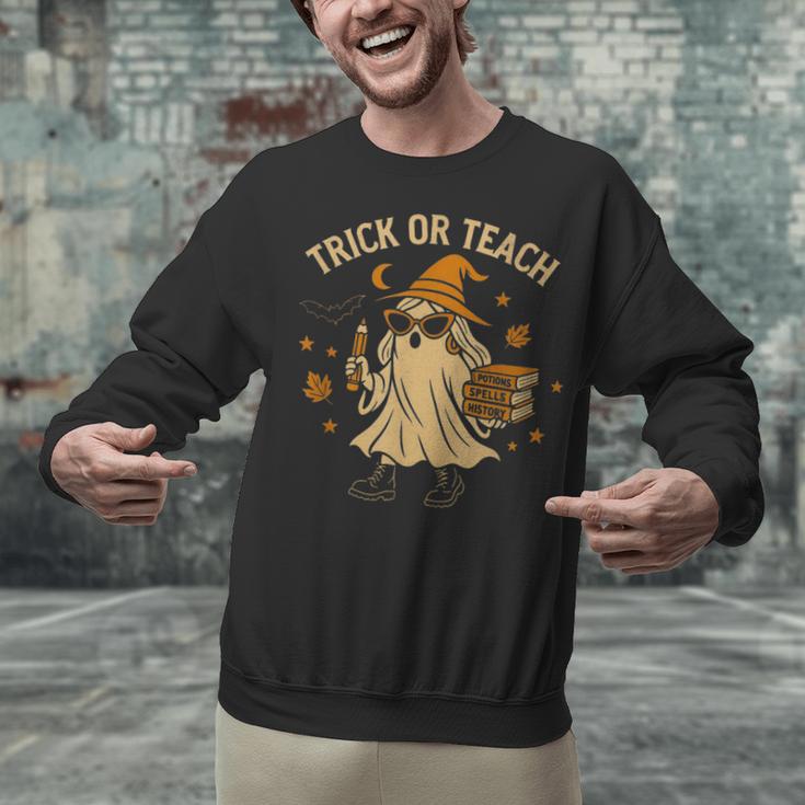 Trick Or Teach Halloween Teacher Unisex Sweatshirt, gift for family, gift for coworker