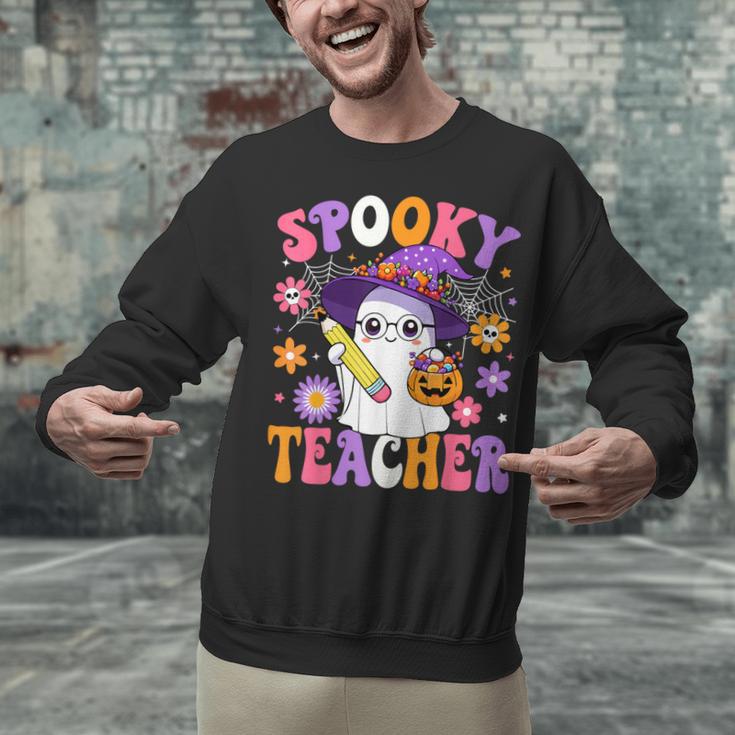Trick Or Teach Spooky Teacher Ghost Halloween Teacher Unisex Sweatshirt, gift for family, gift for coworker