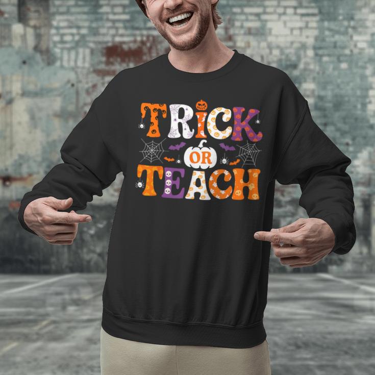 Trick Or Teach Teacher Halloween Costume Men Women Unisex Sweatshirt, gift for family, gift for coworker Trick Or Teach Teacher Halloween Costume Men Women Unisex Sweatshirt, gift for family, gift for coworker