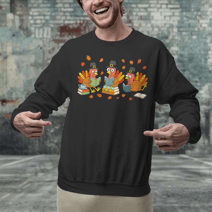 Turkey Reading Books Fall Thanksgiving Teacher Student Unisex Sweatshirt, gift for family, gift for coworker Turkey Reading Books Fall Thanksgiving Teacher Student Unisex Sweatshirt, gift for family, gift for coworker