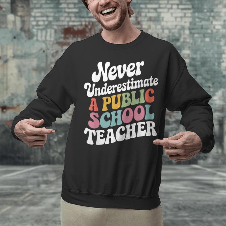 Never Underestimate a Public School Teacher Public Education Unisex Sweatshirt, gift for family, gift for coworker Never Underestimate a Public School Teacher Public Education Unisex Sweatshirt, gift for family, gift for coworker