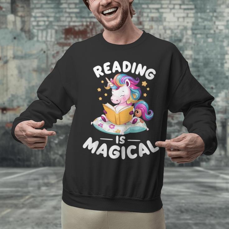 Unicorn Teacher Reading Is Magical Book Unisex Sweatshirt, gift for family, gift for coworker