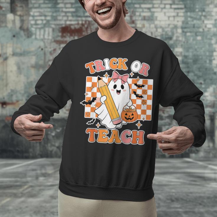 Vintage Teacher Shirt Women Trick Or Teach Halloween Unisex Sweatshirt, gift for family, gift for coworker Vintage Teacher Shirt Women Trick Or Teach Halloween Unisex Sweatshirt, gift for family, gift for coworker