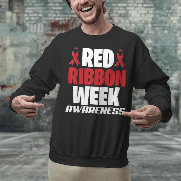 We Wear Red For Red Ribbon Week Awareness Mothers Teachers Unisex Sweatshirt, gift for family, gift for coworker We Wear Red For Red Ribbon Week Awareness Mothers Teachers Unisex Sweatshirt, gift for family, gift for coworker