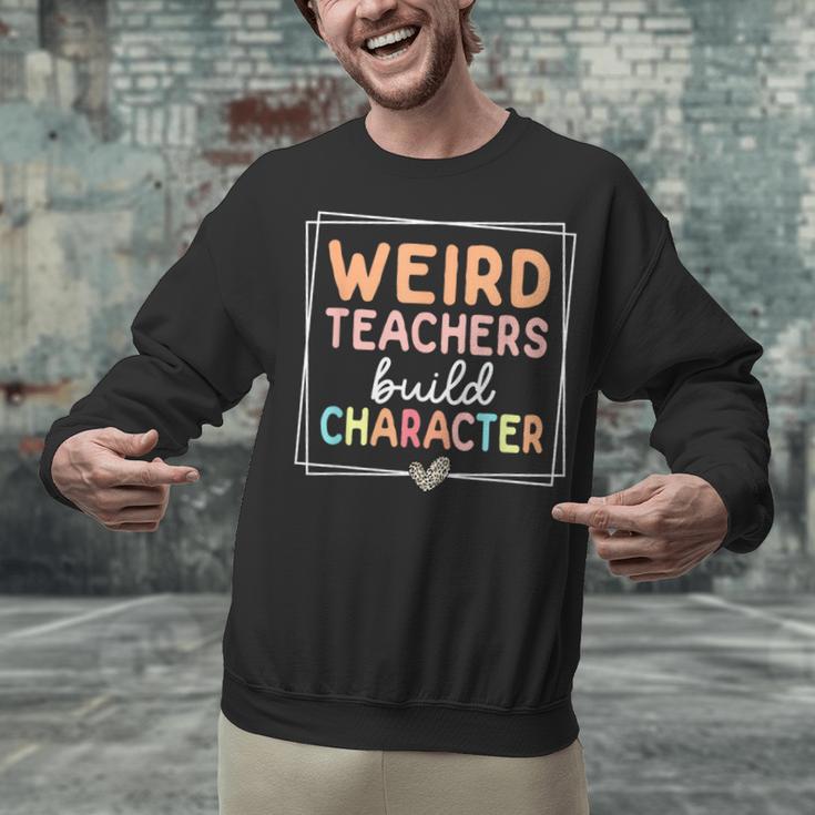 Weird Teachers Build Character Leopard Retro Teacher Unisex Sweatshirt, gift for family, gift for coworker Weird Teachers Build Character Leopard Retro Teacher Unisex Sweatshirt, gift for family, gift for coworker