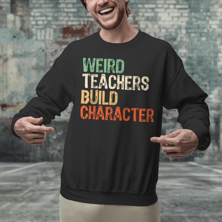 Weird Teachers Build Character Teacher Appreciation Week Day Unisex Sweatshirt, gift for family, gift for coworker Weird Teachers Build Character Teacher Appreciation Week Day Unisex Sweatshirt, gift for family, gift for coworker