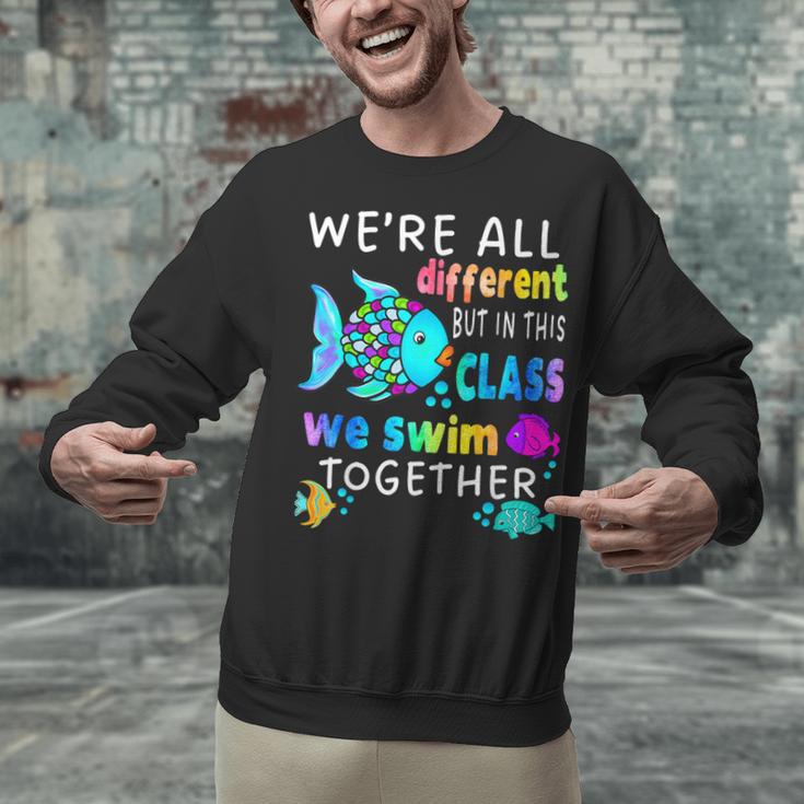 We'Re All Different But We Swim Together Elementary Teacher Unisex Sweatshirt, gift for family, gift for coworker We'Re All Different But We Swim Together Elementary Teacher Unisex Sweatshirt, gift for family, gift for coworker
