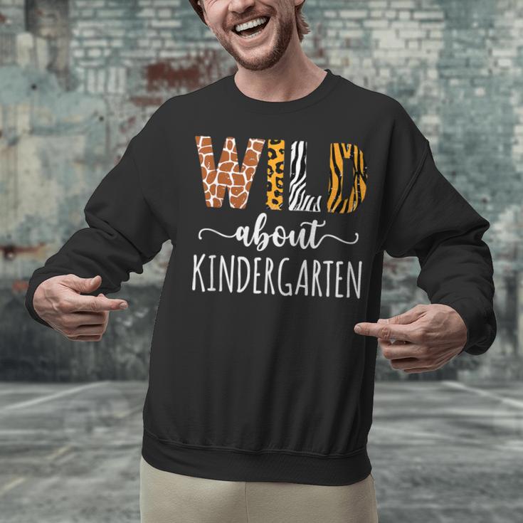 Wild About Kindergarten Teacher Leopard Print Unisex Sweatshirt, gift for family, gift for coworker Wild About Kindergarten Teacher Leopard Print Unisex Sweatshirt, gift for family, gift for coworker