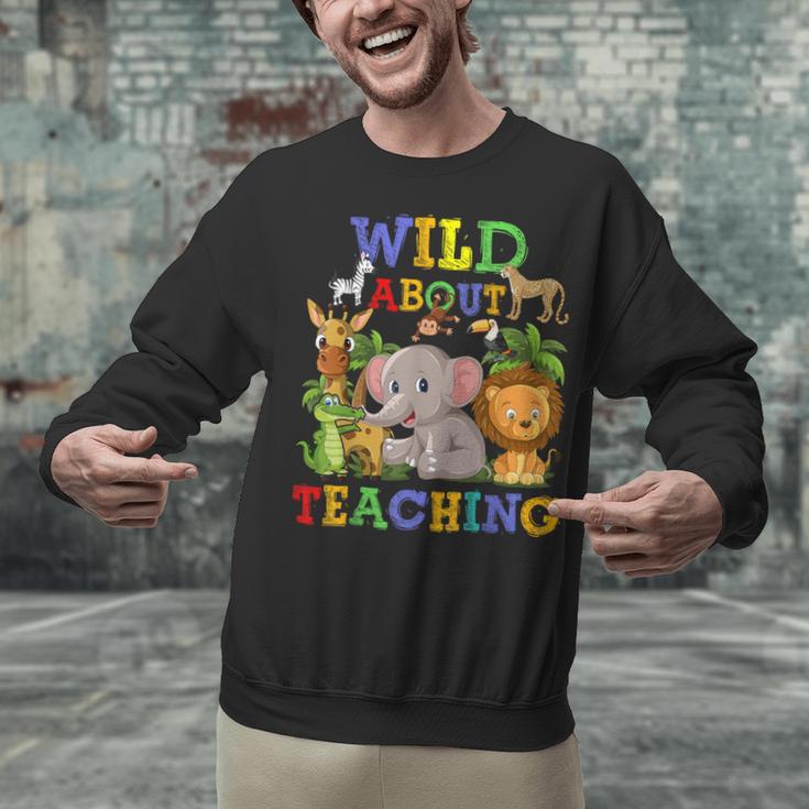 Wild About Teaching Safari Jungle School Teacher Unisex Sweatshirt, gift for family, gift for coworker Wild About Teaching Safari Jungle School Teacher Unisex Sweatshirt, gift for family, gift for coworker