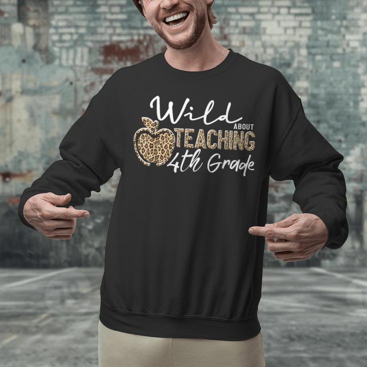 Wild About Teaching School Crew 4th Grade Teacher Squad Unisex Sweatshirt, 4th Grade Teacher Sweatshirts, gift for family, gift for coworker