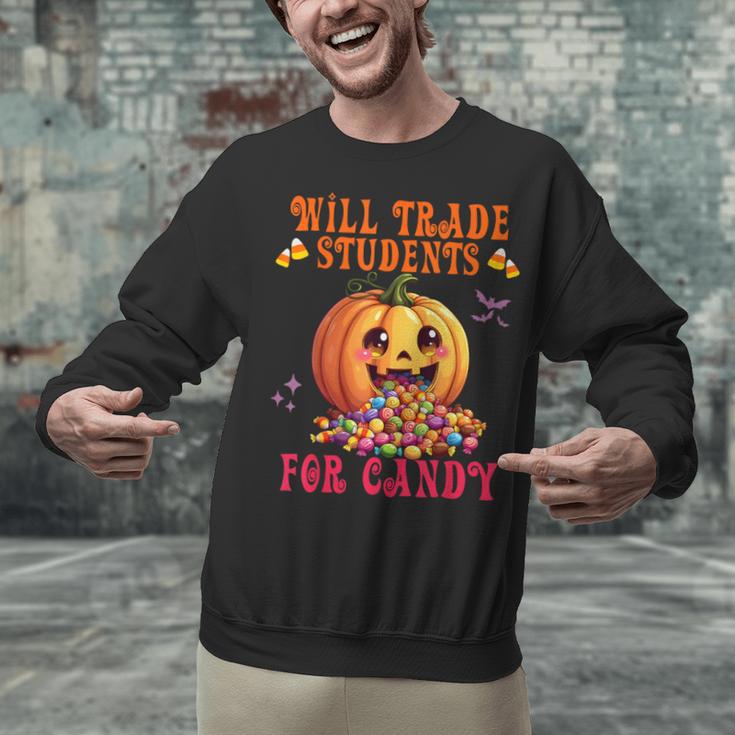 Will Trade Students For Candy Teacher Cute Halloween Pumpkin Unisex Sweatshirt, gift for family, gift for coworker Will Trade Students For Candy Teacher Cute Halloween Pumpkin Unisex Sweatshirt, gift for family, gift for coworker