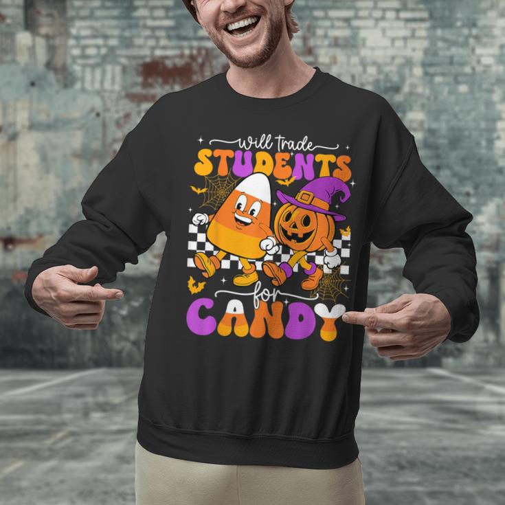 Will Trade Students For Candy Teacher Halloween Unisex Sweatshirt, gift for family, gift for coworker Will Trade Students For Candy Teacher Halloween Unisex Sweatshirt, gift for family, gift for coworker