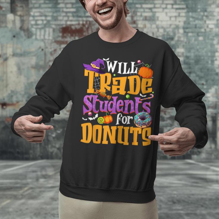 Will Trade Students For Donuts Halloween Teacher Unisex Sweatshirt, gift for family, gift for coworker