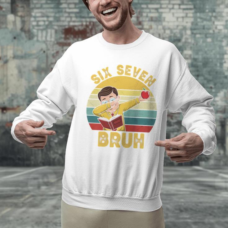 67 Meme Six Seven Bruh Retro Dabbing Teacher School Unisex Sweatshirt, gift for family, gift for coworker 67 Meme Six Seven Bruh Retro Dabbing Teacher School Unisex Sweatshirt, gift for family, gift for coworker