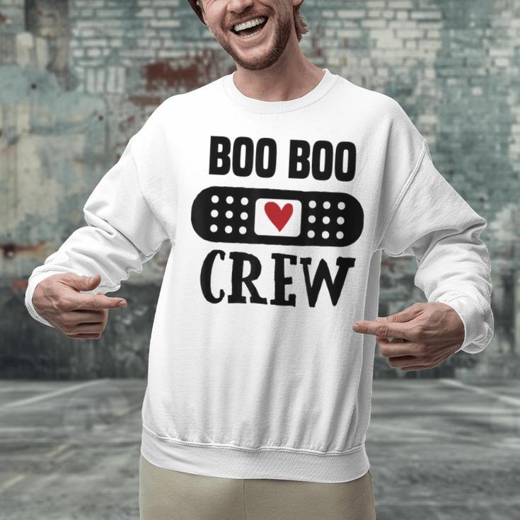 Boo Boo Crew First Aid School Nurse Day Care Teacher Unisex Sweatshirt, gift for family, gift for coworker Boo Boo Crew First Aid School Nurse Day Care Teacher Unisex Sweatshirt, gift for family, gift for coworker