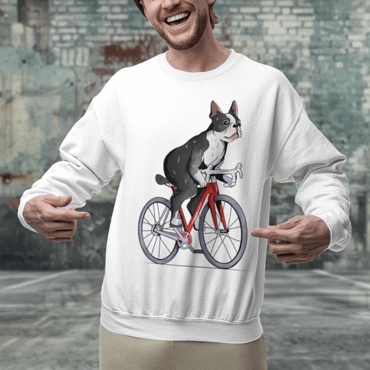 Boston Terrier Riding Bicycle Cute Bostie Biker Raglan Baseball Tee Unisex Sweatshirt, Boston Terrier Riding Sweatshirts, gift for family, gift for coworker