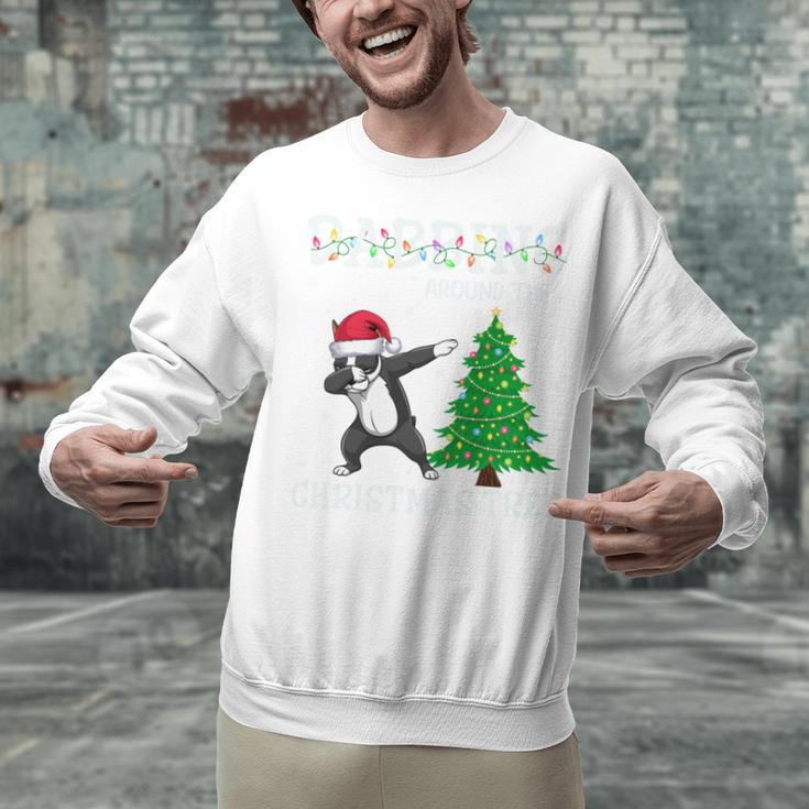 Boston Terrier Santa Hat Dabbing Around The Christmas Tree Unisex Sweatshirt, Boston Terrier Christmas Sweatshirts, gift for family, gift for coworker