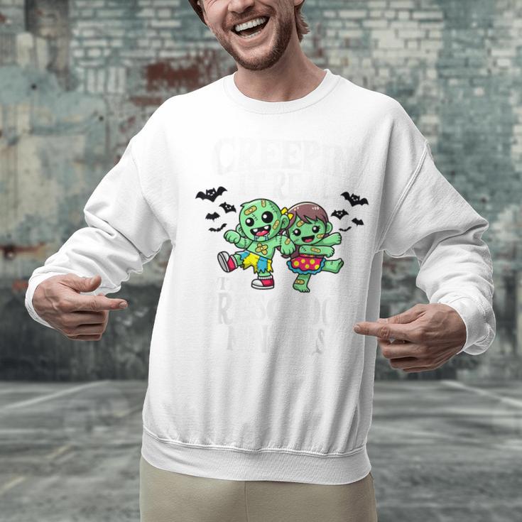 Creepin It Real Monster School Preschool Teacher Halloween Unisex Sweatshirt, gift for family, gift for coworker Creepin It Real Monster School Preschool Teacher Halloween Unisex Sweatshirt, gift for family, gift for coworker